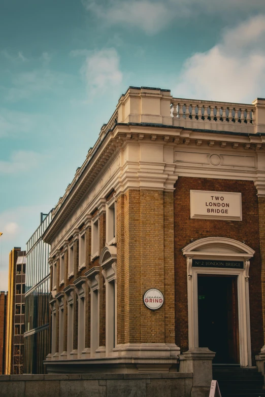 an old building that is very large with a sign on the front