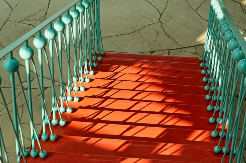 a set of stairs with blue balconies