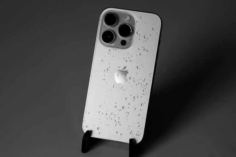 the front of an iphone case with water droplets