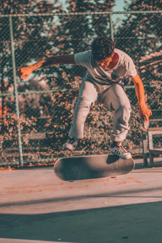 a person jumping up on a skateboard