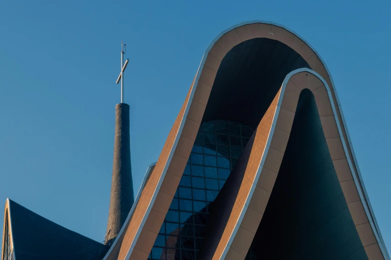 a very tall building with a metal roof