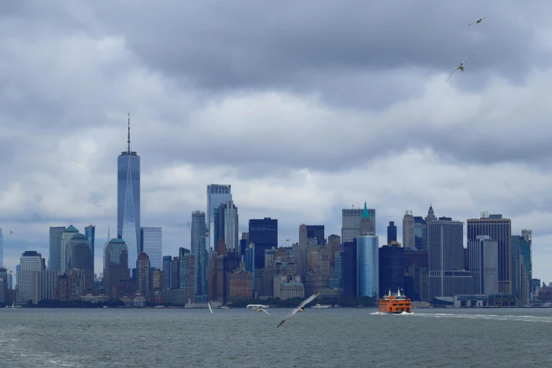 a very large city skyline with a big boat