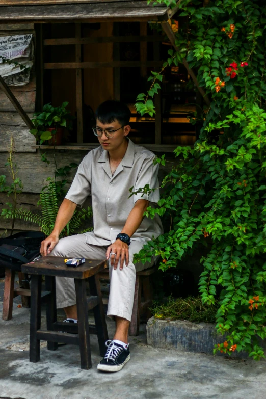 a person that is sitting on a table