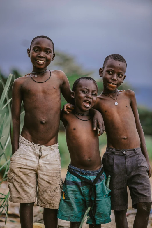 a group of three little s standing next to each other