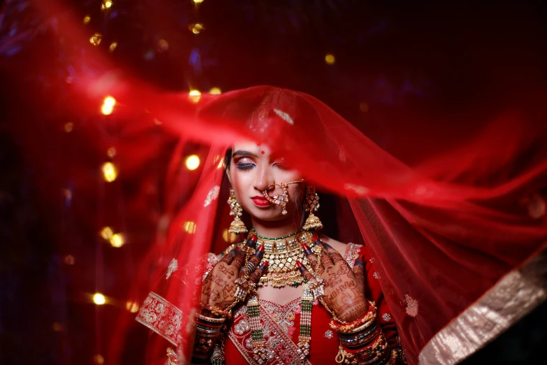 a woman wearing gold and red in costume