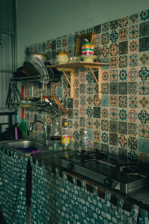 a kitchen with pots and pans on the counter