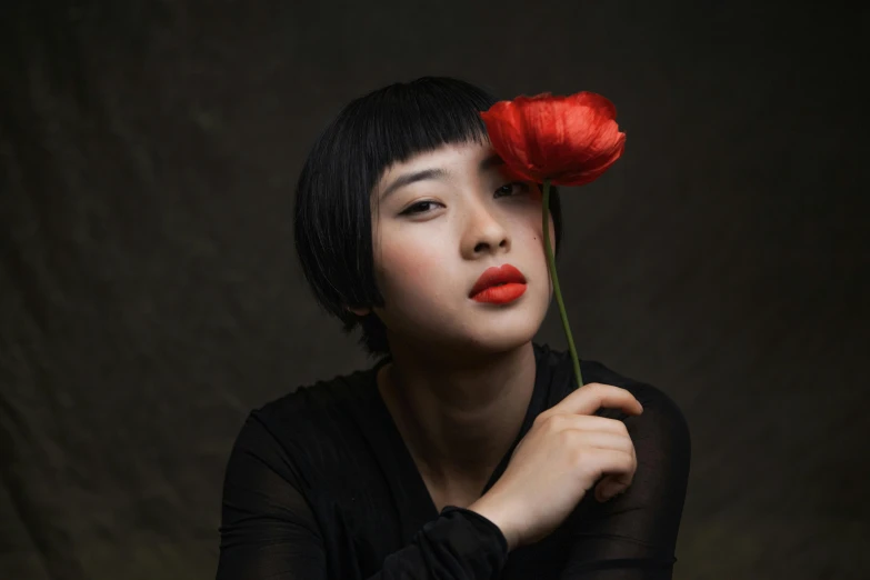 a woman with a flower on her head