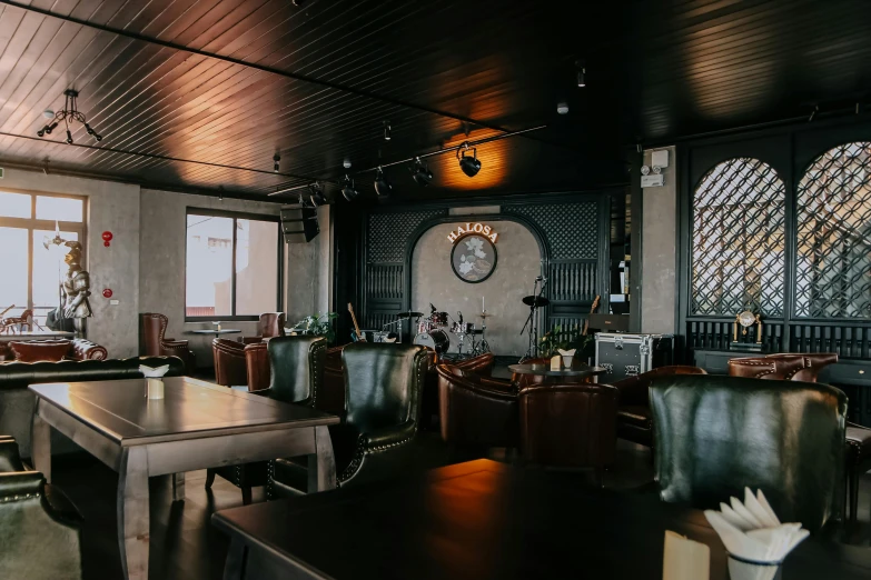 a restaurant with a pool table in the middle