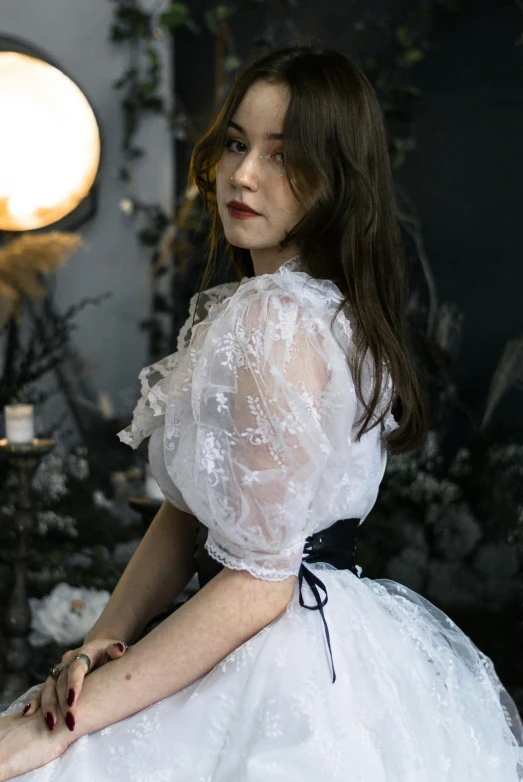 young beautiful woman posing in her wedding dress