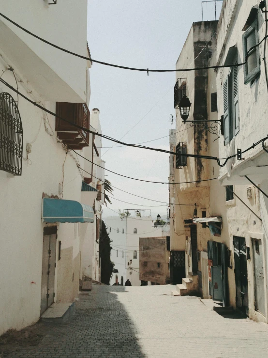 the light shines in the distance on a street