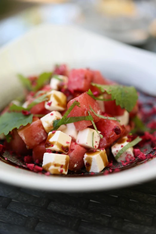 a watermelon and tofu salad is seen here