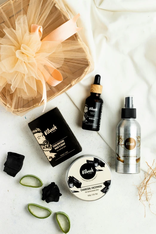 some products sitting on a table in front of some hair care items