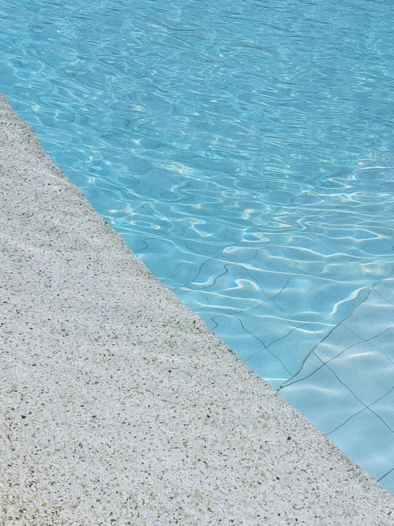 an empty swimming pool is shown from the side