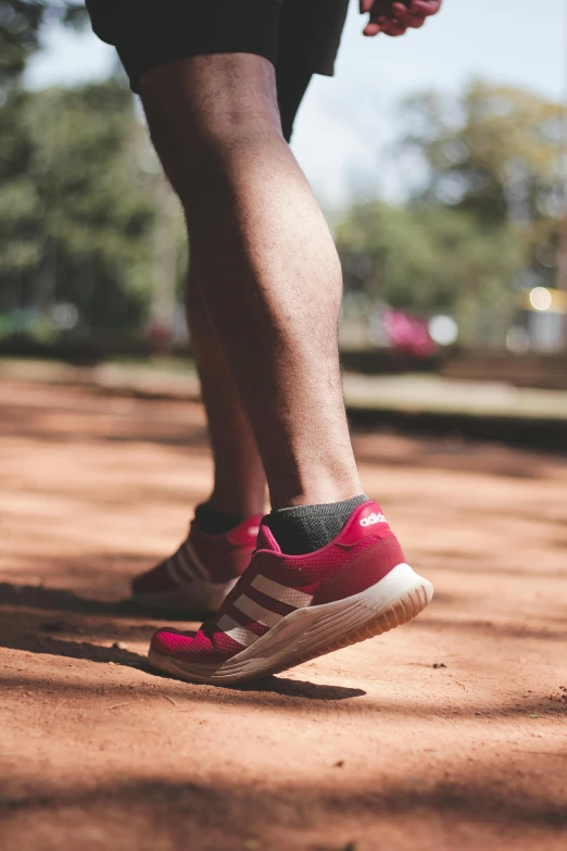 a close up of the feet and foot on a person walking