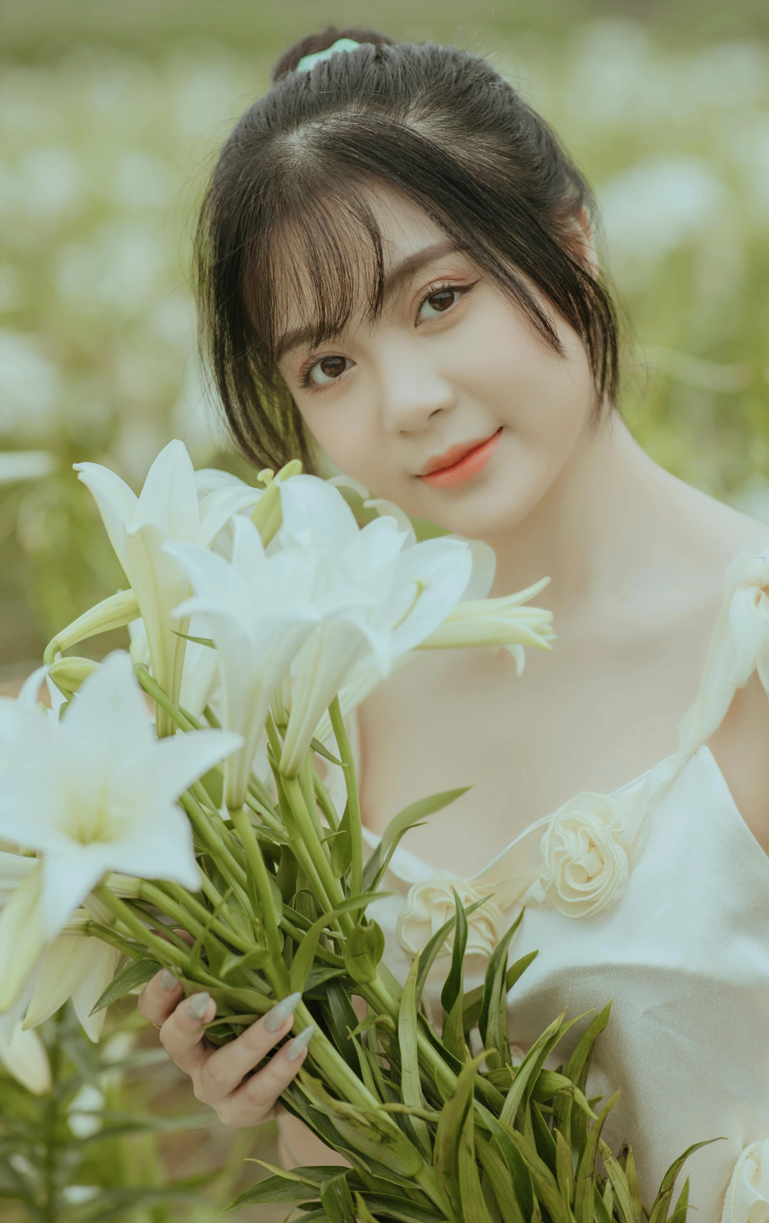 a woman is posing with white flowers