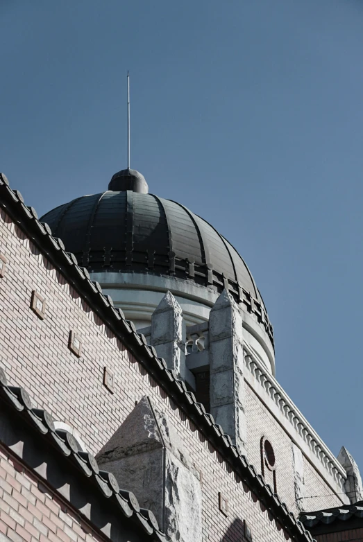 there is a building with a tower and dome