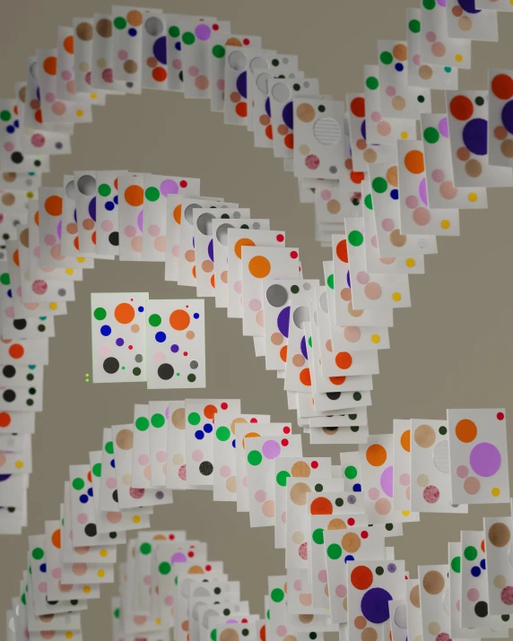 a colorful collage with lots of circles and spots on it