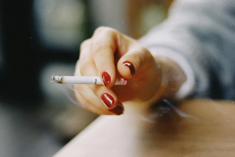 an image of a woman smoking a cigarette