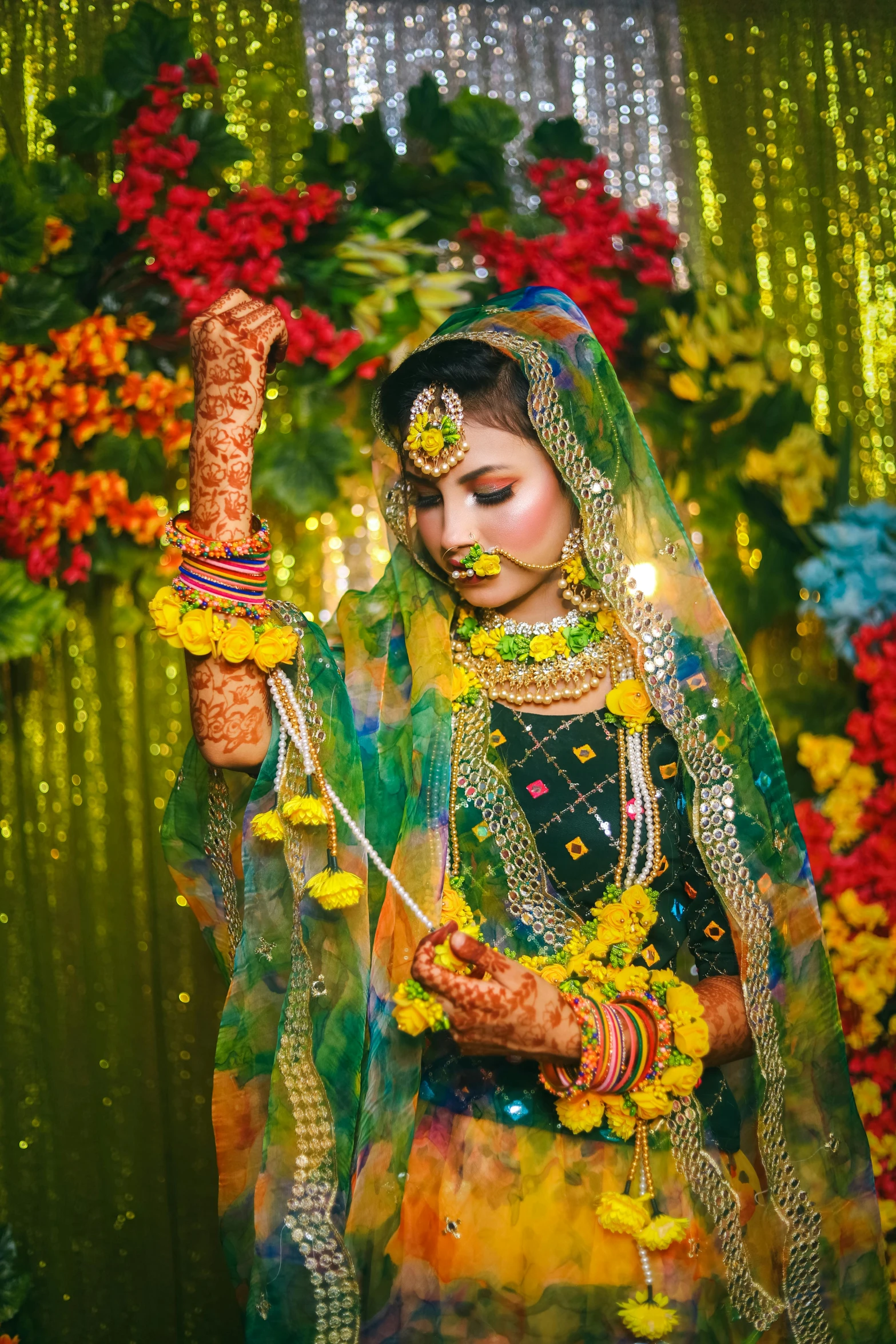 a beautiful bride dressed in green and yellow