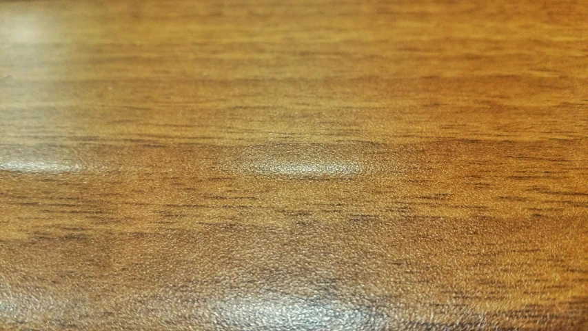 the table top is wood very shiny