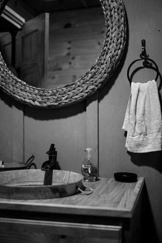 bathroom with large rope hanging over sink