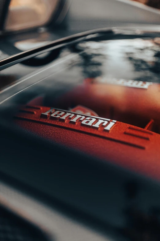 a close up of a car showing the nameplates and emblem