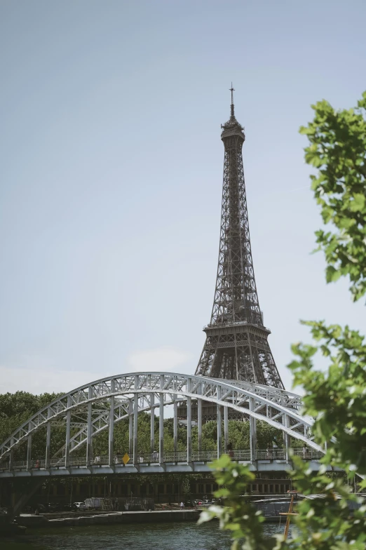 a view of the eiffel tower from across the river