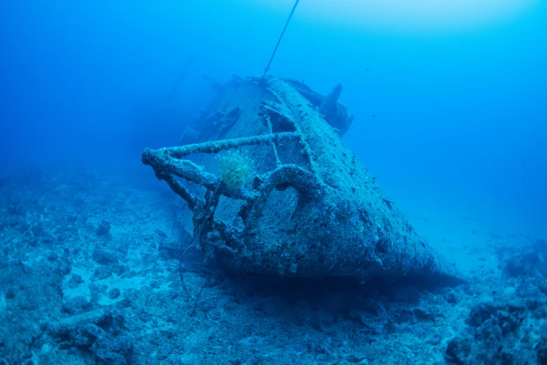 a wreck on the sea bottom with water surrounding it