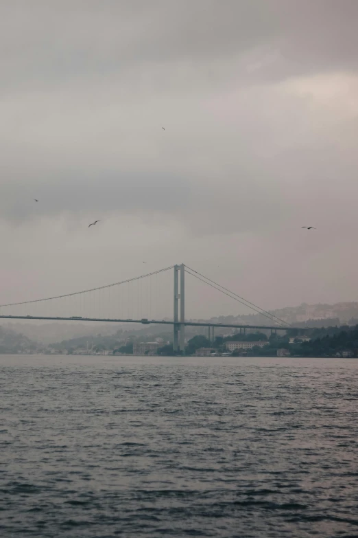 a view of the bay bridge from the waters edge