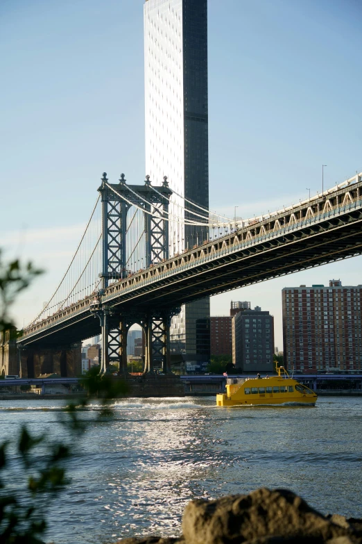 a very long bridge and some water in the background