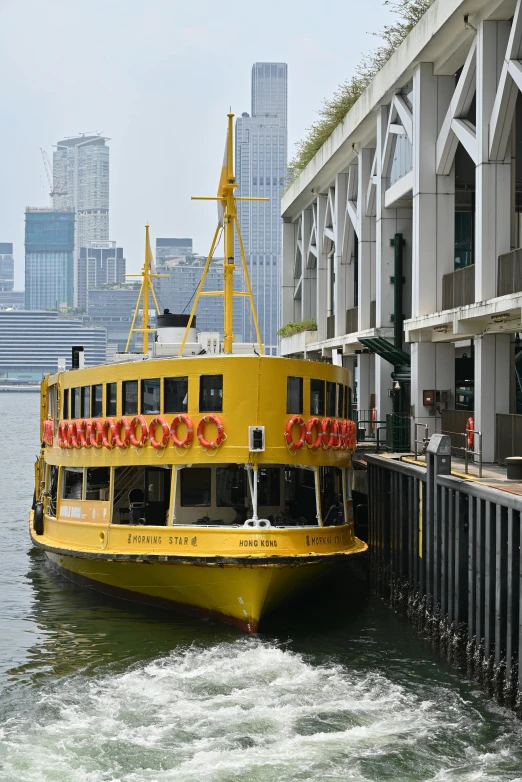 the boat is passing a large harbor line