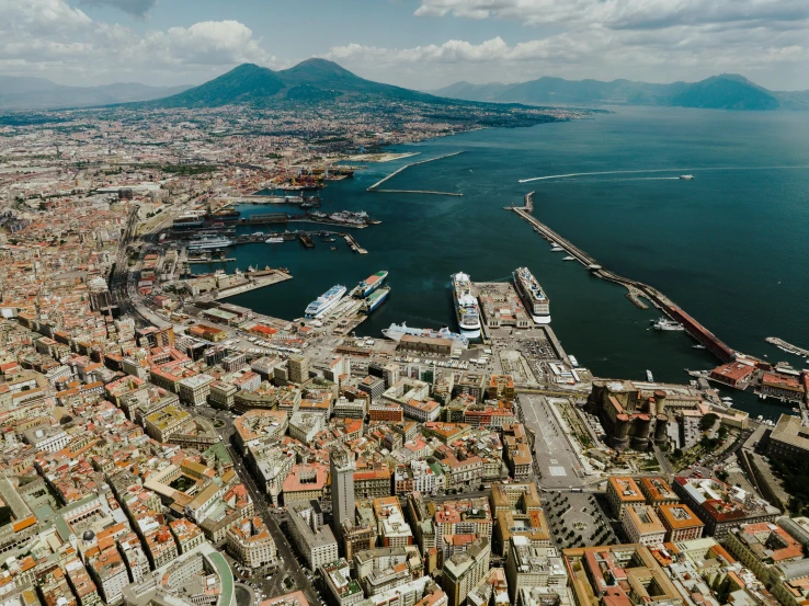 an aerial view of a large city on the shore