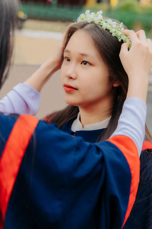 young asian woman getting help by her mother