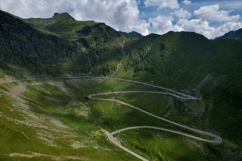 several winding, paved roads leading into the mountain range