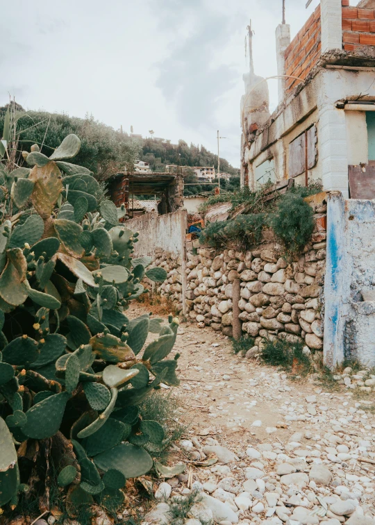 a small building with rocks around it