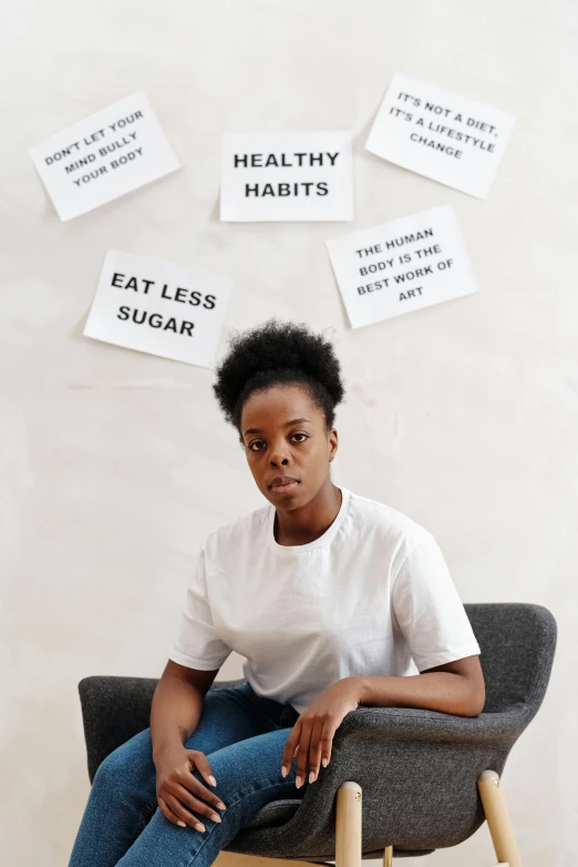 a woman sitting in a chair with the words healthy, hearts, and sugar above her head