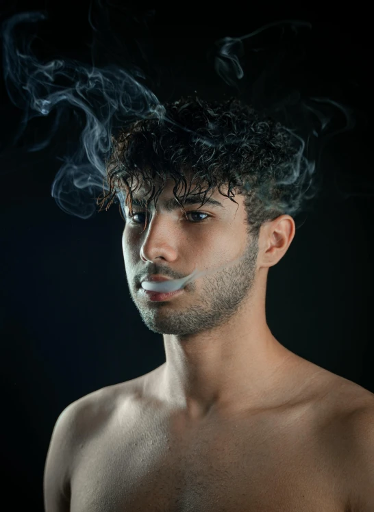 a man with  on is shown smoking