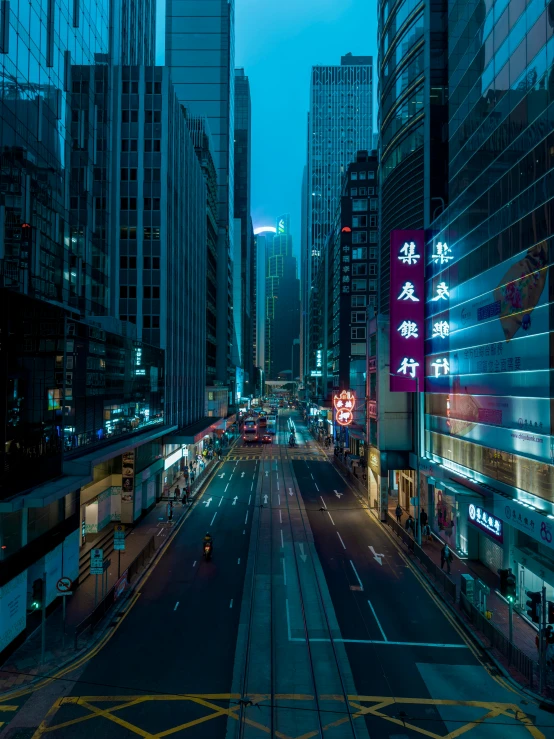night time view of city buildings with lights