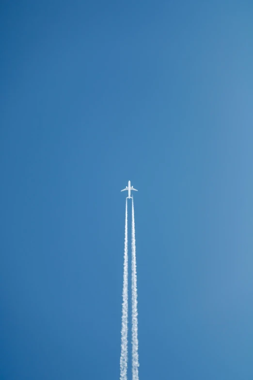 an airplane is ascending high into the sky