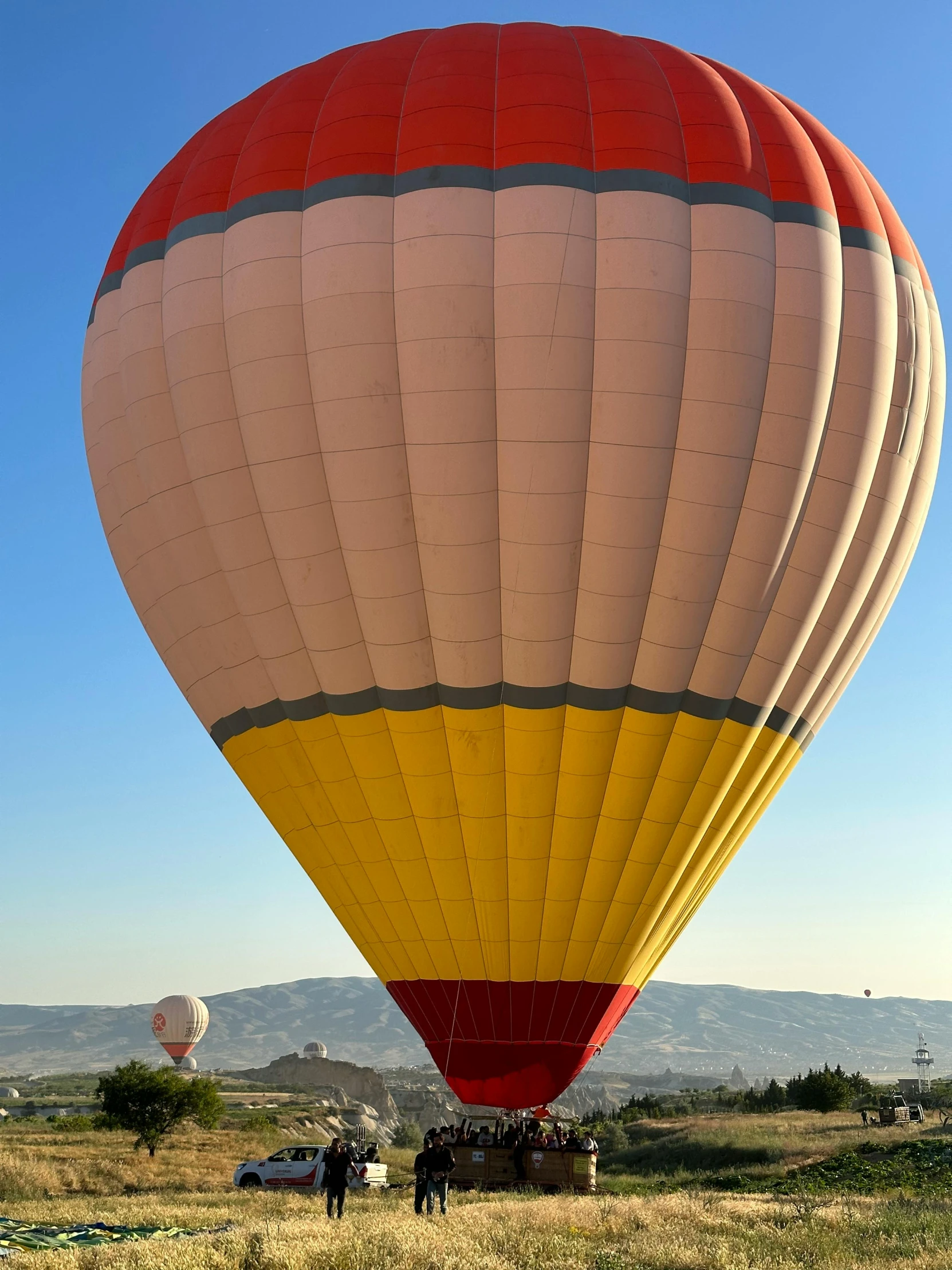 a large  air balloon flying through the air