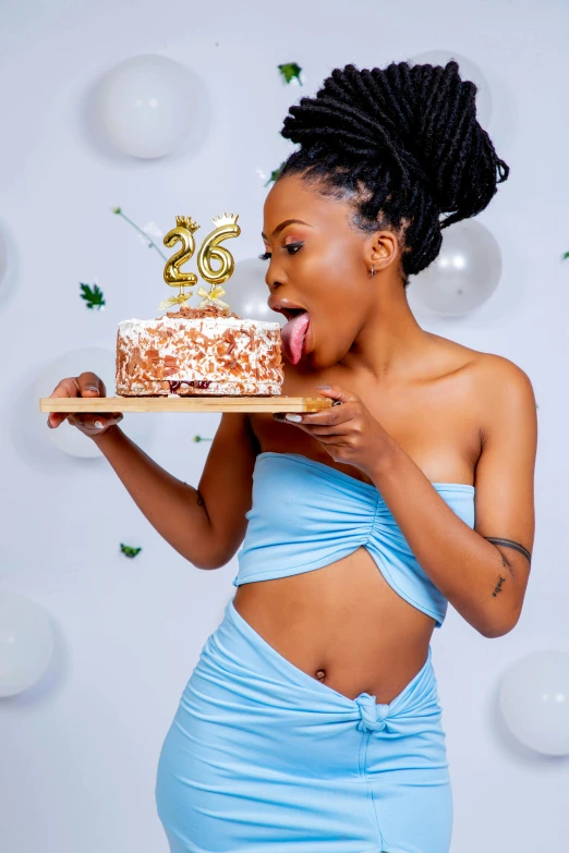 woman eating cake with her finger