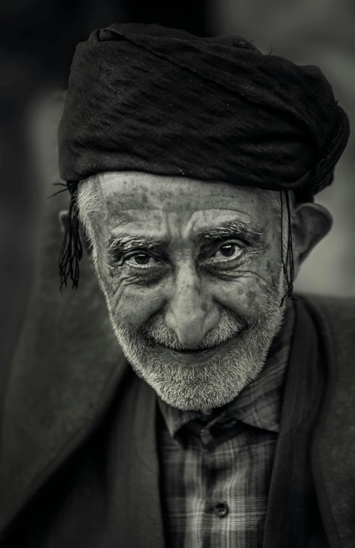 a man with a beard in a hat