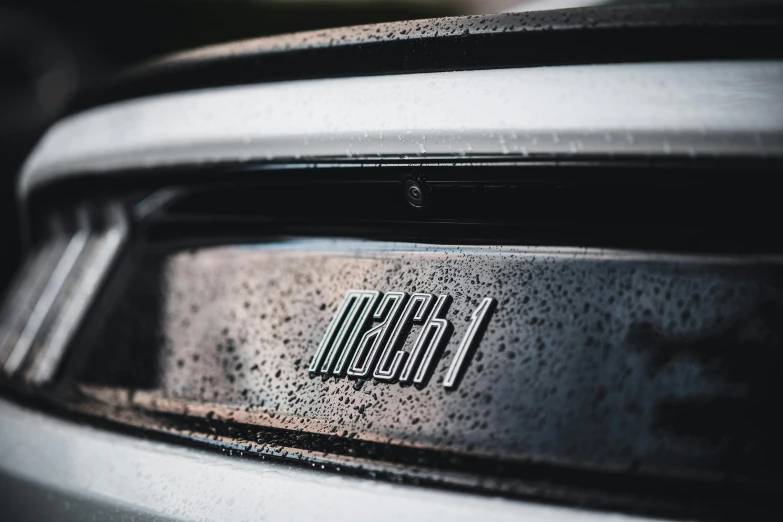 an emblem on the rear bumper of a car