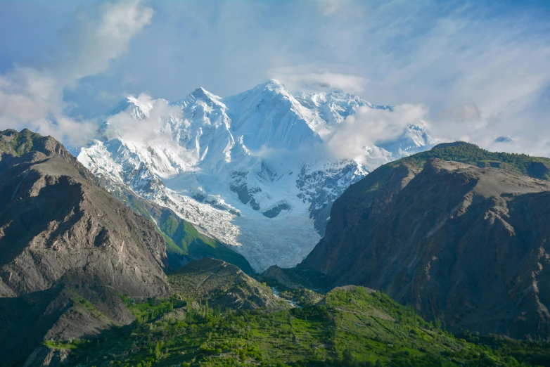 a snow capped mountain stands in the distance