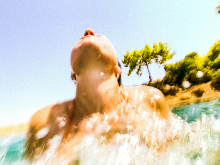 a person swimming under a body of water