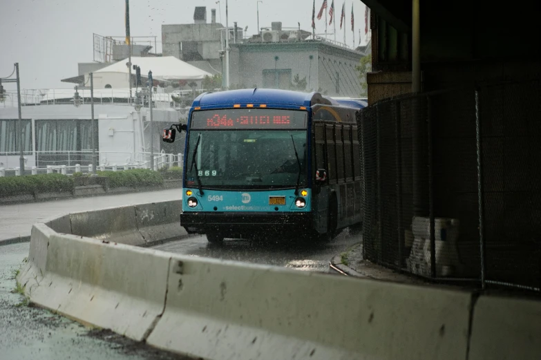 a public transit bus on a rainy day