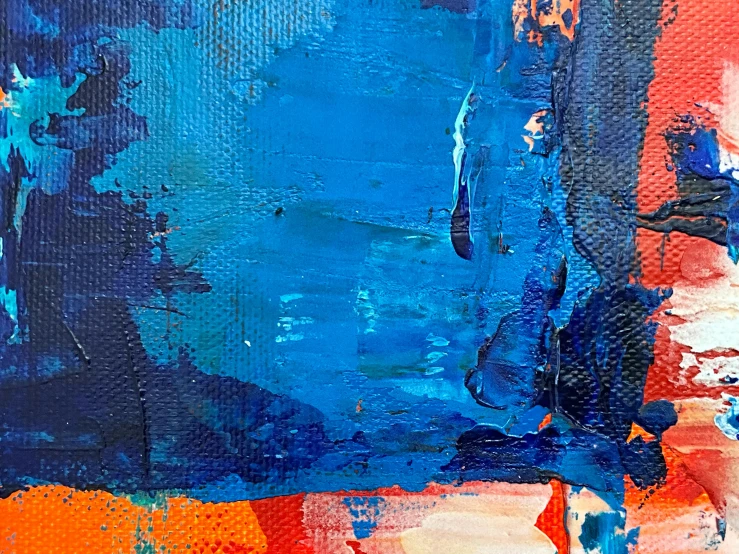 abstract painting with blue and orange hues