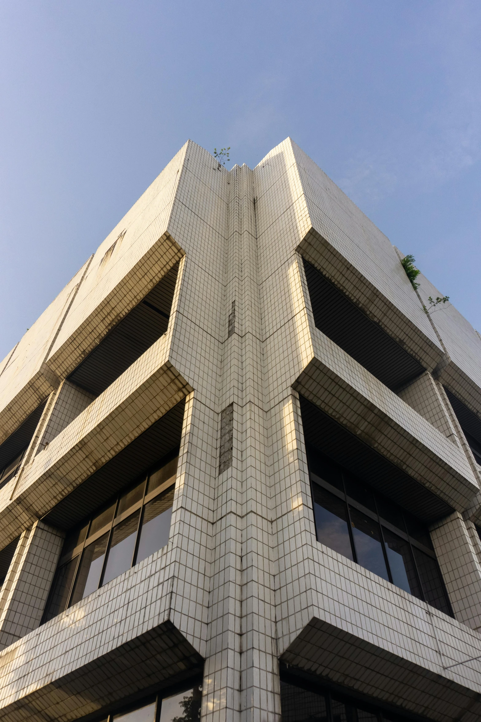 a white clock on top of a tower