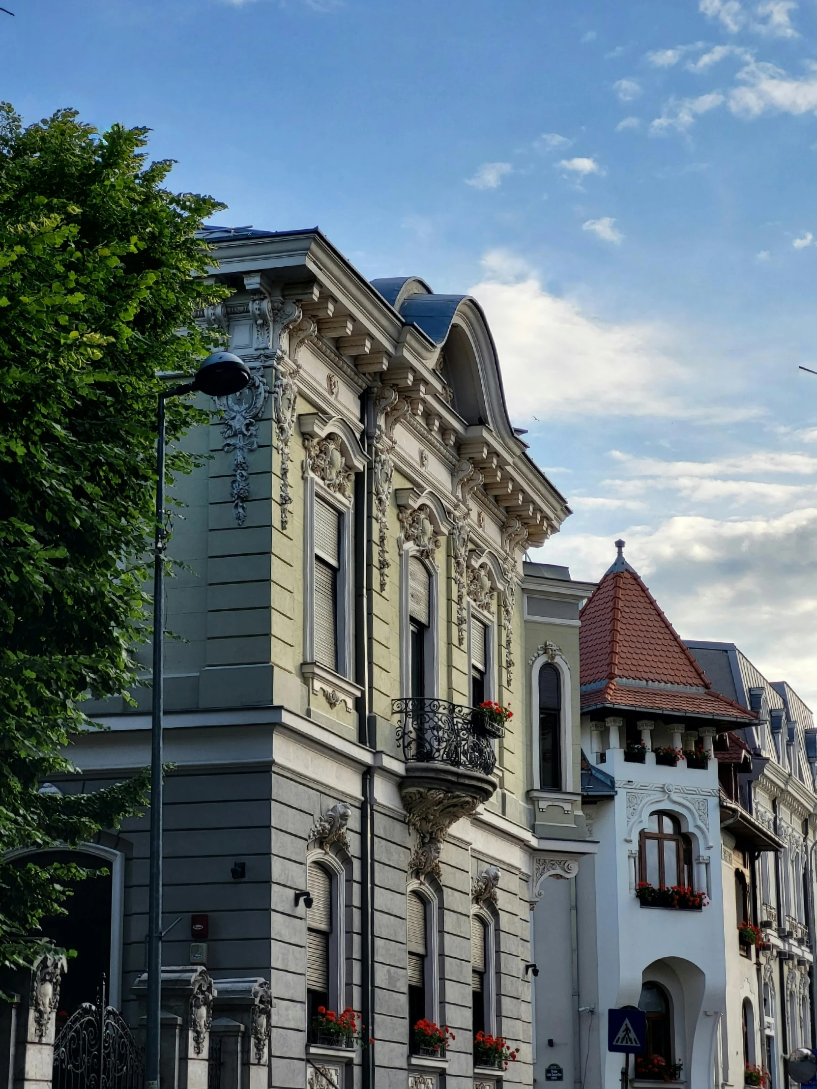 an old town style house with decorative windows