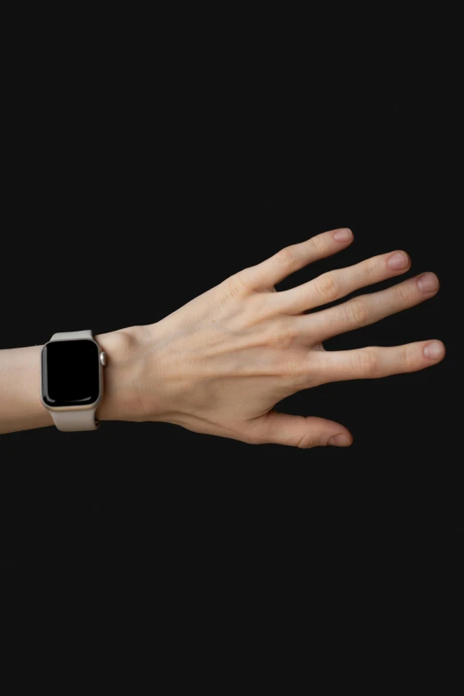 a hand with an apple watch in the palm